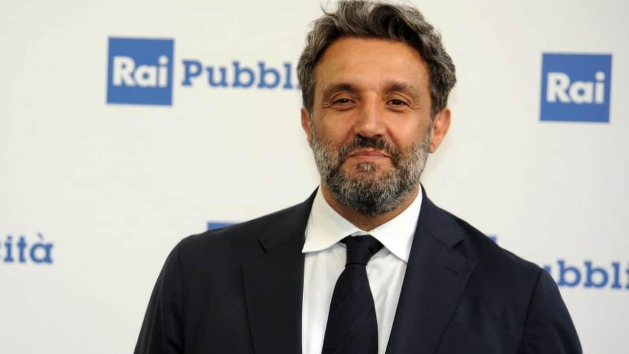 Flavio Insinna riceve il sostegno di Carlo Conti per L'Eredità