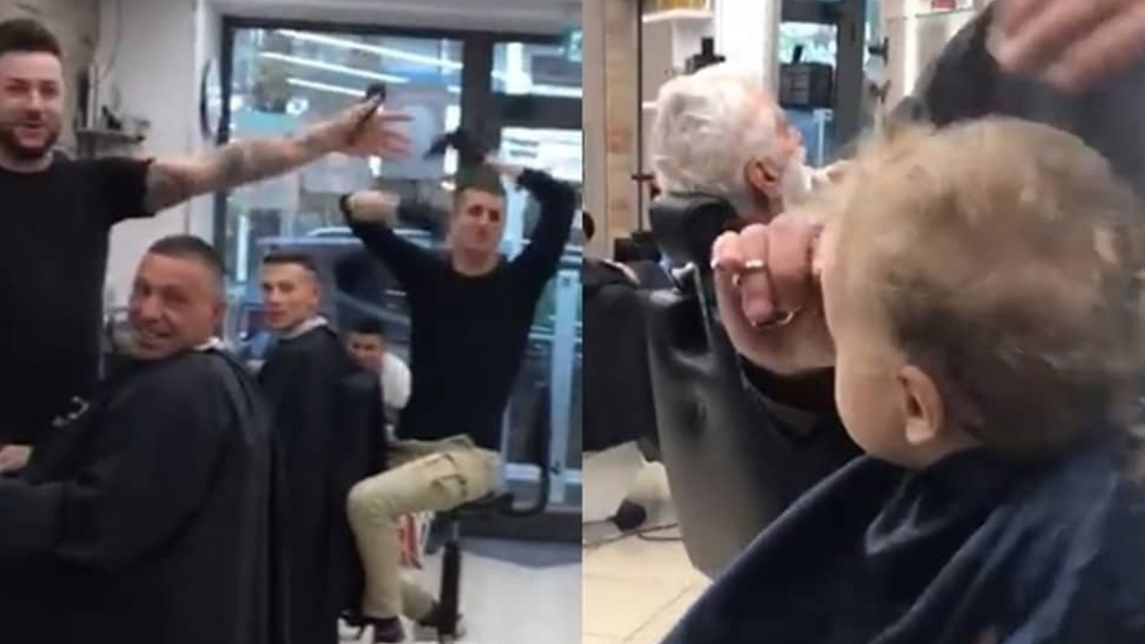 bimbo piange dal barbiere, lo staff lo consola cantando