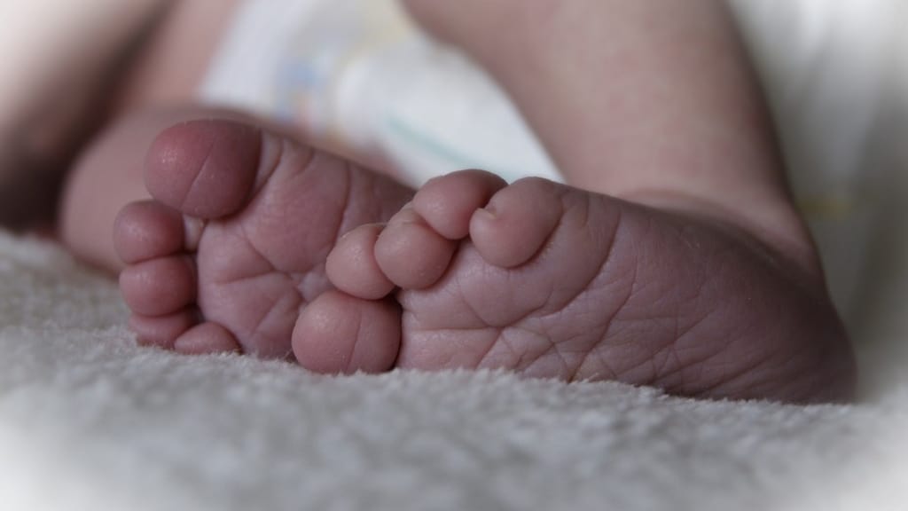 piedi neonato