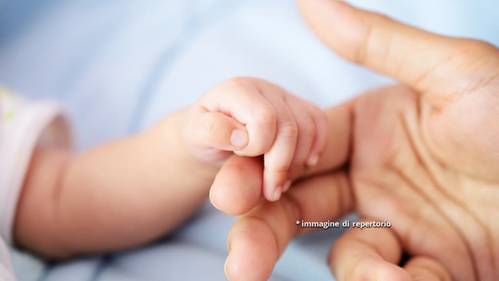 mano bimbo immagine repertorio