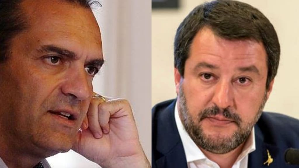 primi piani de magistris e salvini