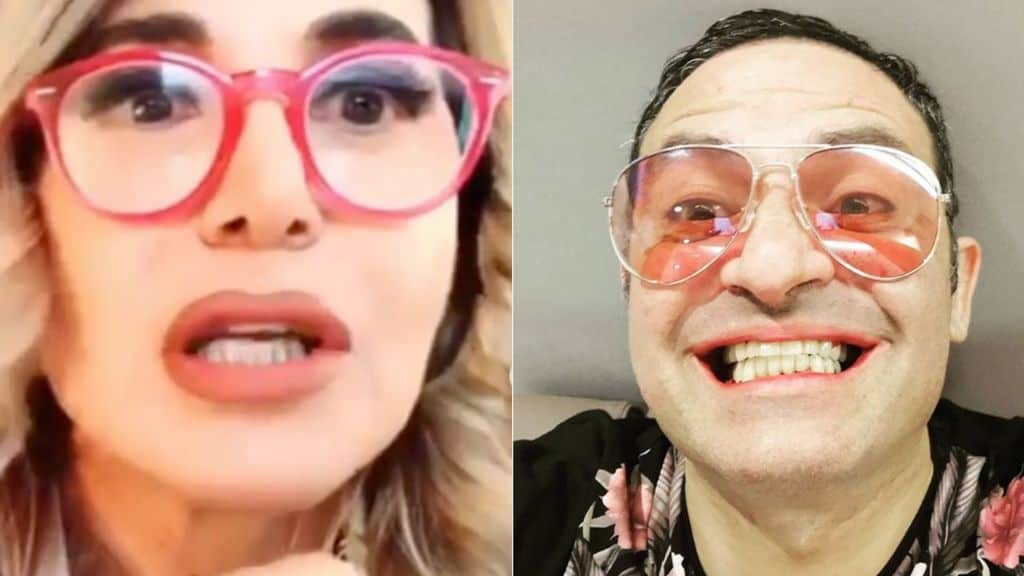 Barbara d'Urso in primo piano e Alberto Dandolo sorridente