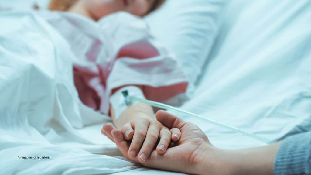 malata nel letto d'ospedale