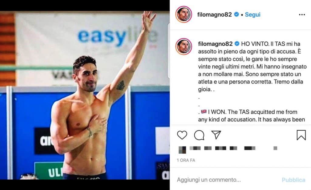 post di Filippo Magnini. A sinistra Magini con il braccio alzato in segno di vittoria