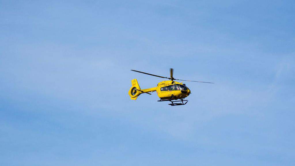 elicottero del soccorso alpino in volo
