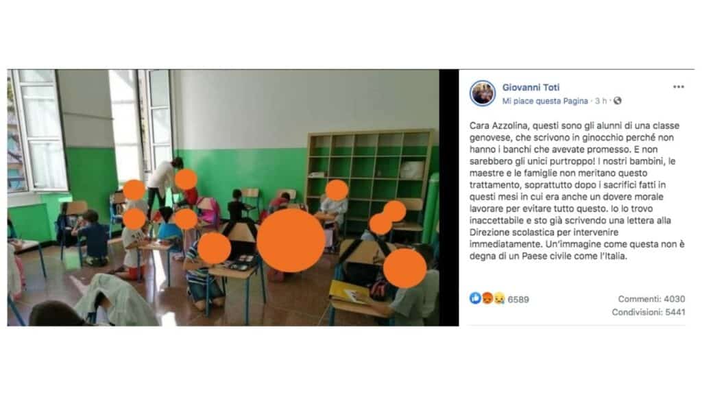 post di giovanni toti con i bambini seduti per terra in classe a genova