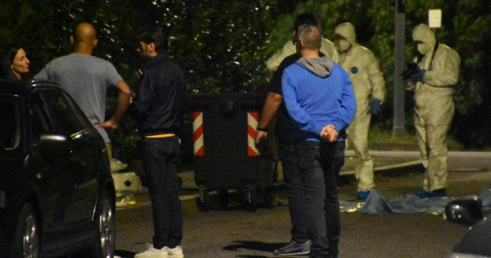 Corpo di un uomo in un cassonetto, quattro arresti