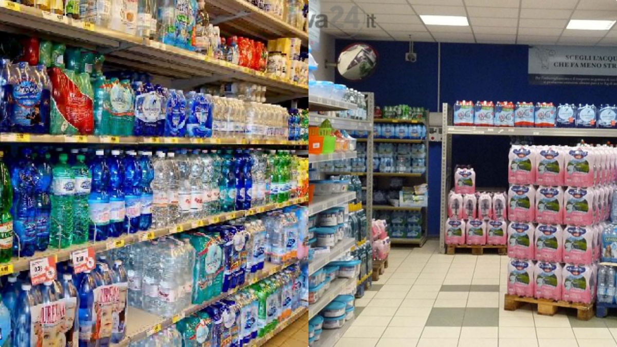 Bottiglie di acqua minerale su uno scaffale di supermercato