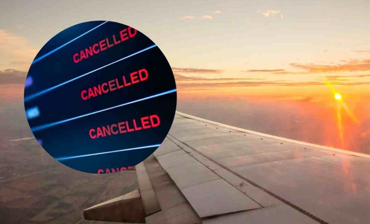 Tabellone partenze in aeroporto con voli cancellati e ritardi